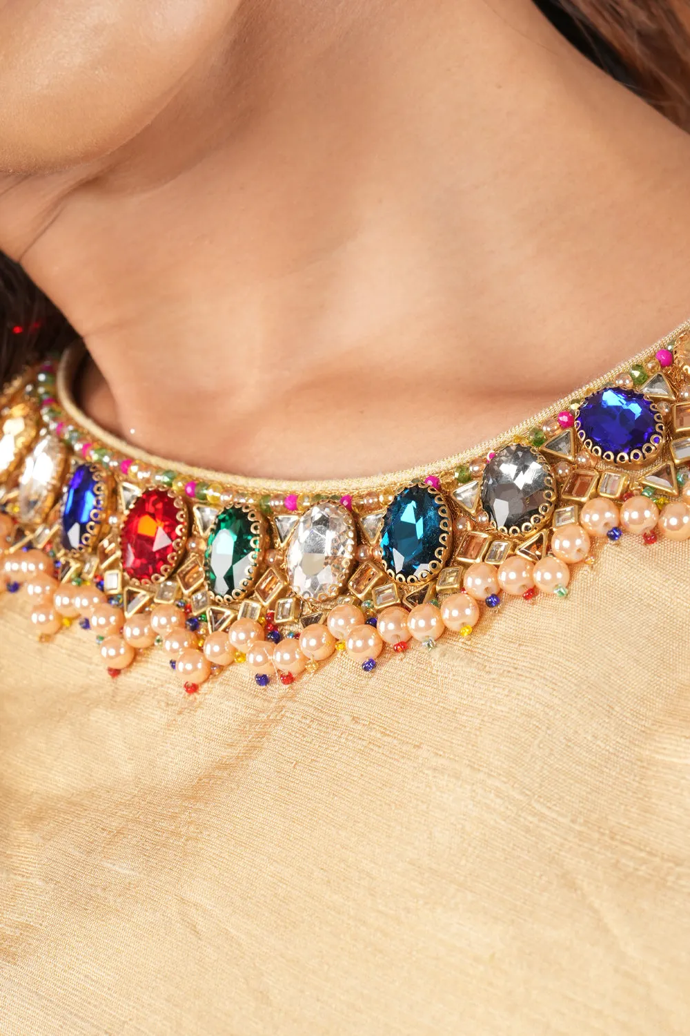 Multicolor Necklace and bajuband handwork detailing on Sandal Pure Tissue Raw Silk Blouse